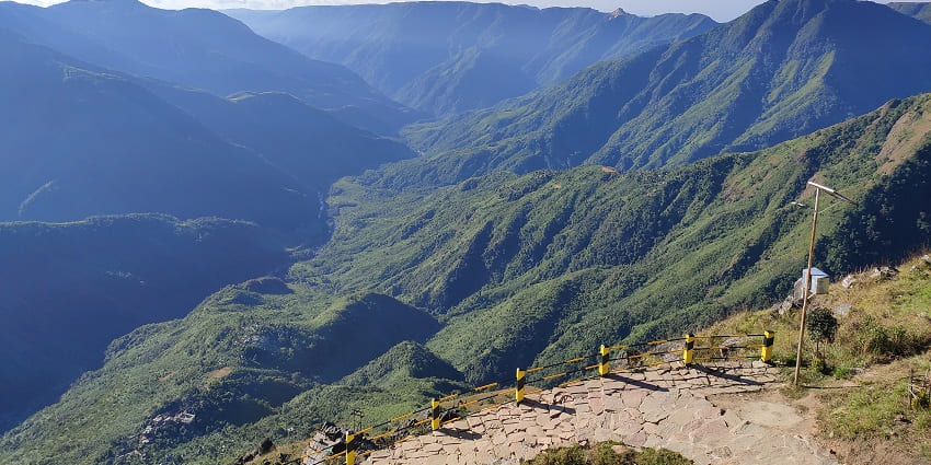 A beautiful panoramic view of the Laitlum Canyons with lush greenery all around.