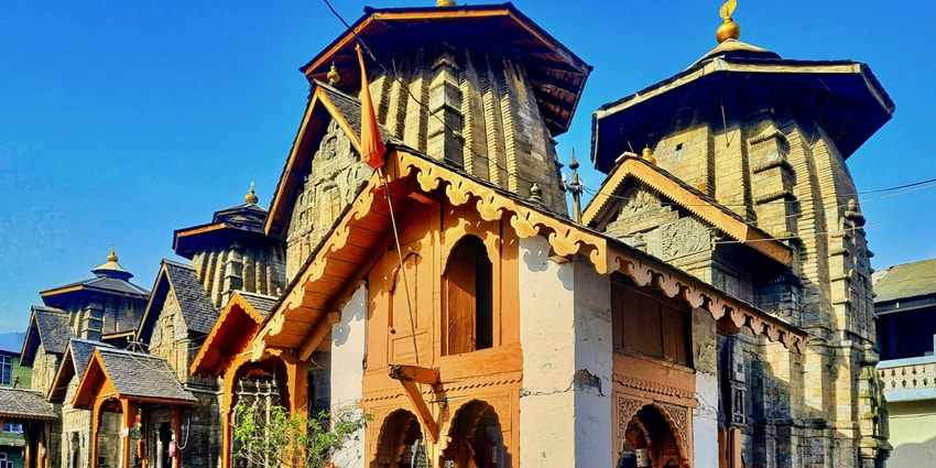 Witness the beautiful stone carvings on the walls showcasing the history of this temple
