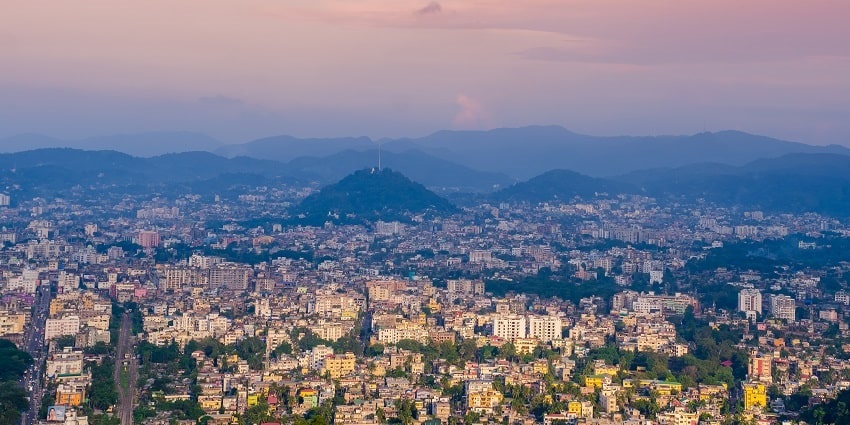 A panoramic view of Guwahati city, Assam and the colourful sky from atop Nilachal hill.