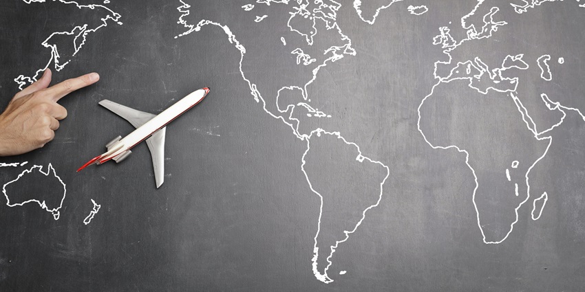A fascinating view of a blackboard with a white map drawn and an aeroplane on the side.