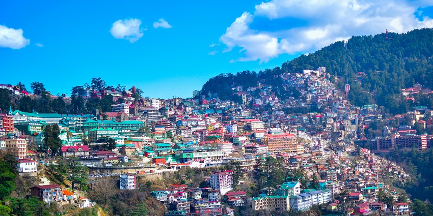 A colourful image of houses in Shimla which is the capital of Himachal Pradesh.