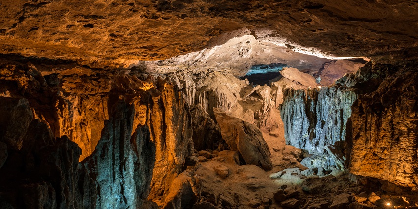 Image of a beautiful cave somewhere in the dense forest– A thrilling place for adventure
