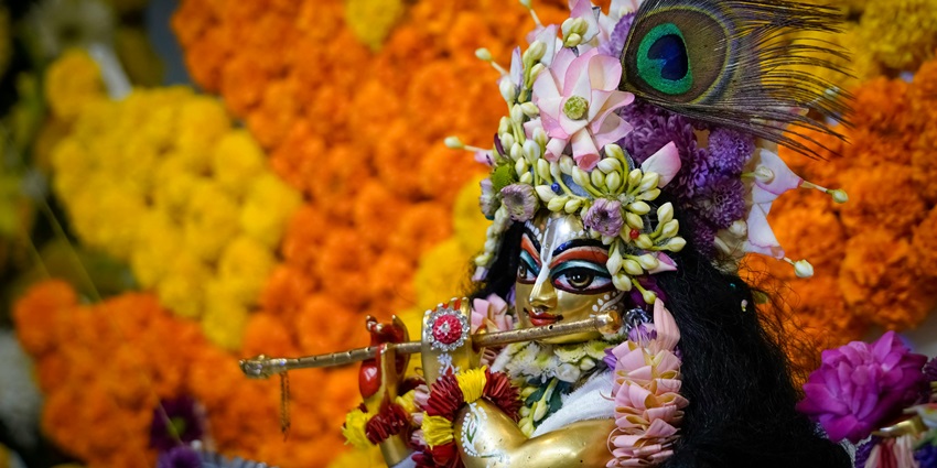 Image of lord Krishna golden figure - Madhab Than is one of the places to visit in Nagaon