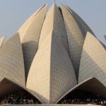 Explore the stunning architecture of Lotus Temple on your trip to India’s capital city.