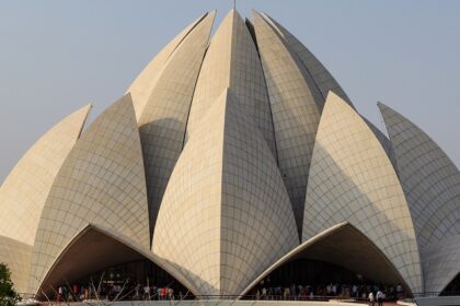 Explore the stunning architecture of Lotus Temple on your trip to India’s capital city.