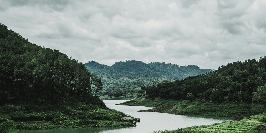 View of lush green hills and river - Kekar Monying, best places to visit in Pasighat