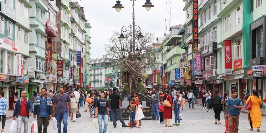 A bustling pedestrian-only street near the Black Cat Museum