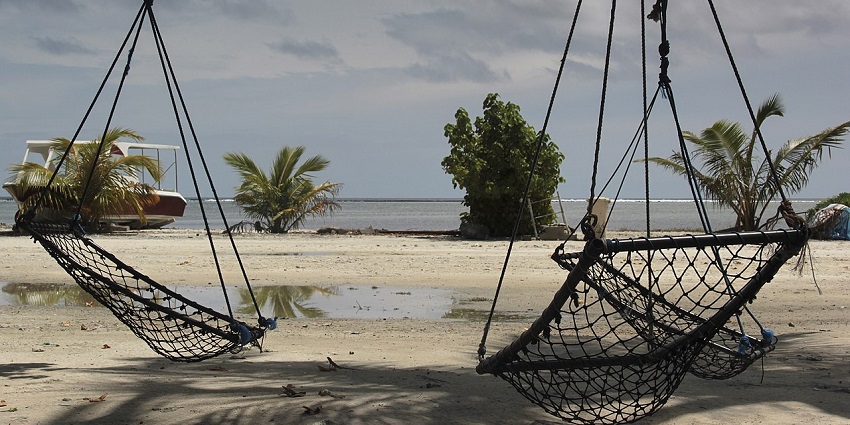Beautiful snap of the cloudy sky and the Hammock in Maafushi–Places to visit in Maldives