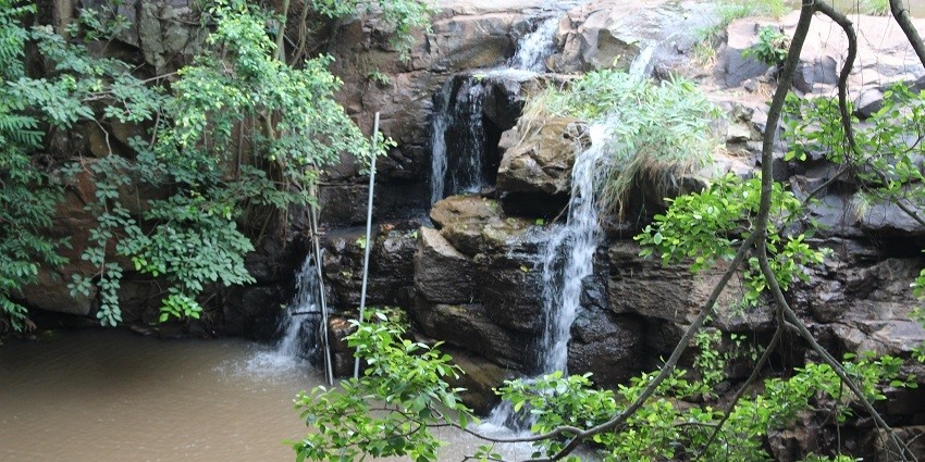 Witness the majestic Mallela Theertham Waterfall on your visit to Mallikarjuna Temple.