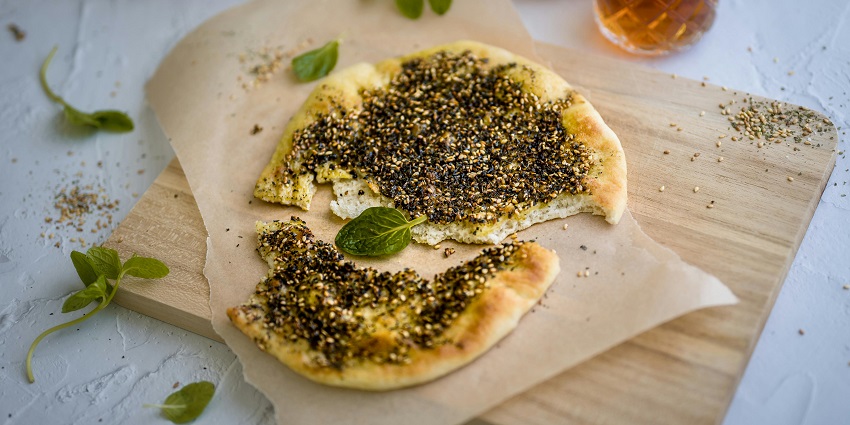Manakish, a popular Middle Eastern flatbread, is a famous street food in Dubai city.