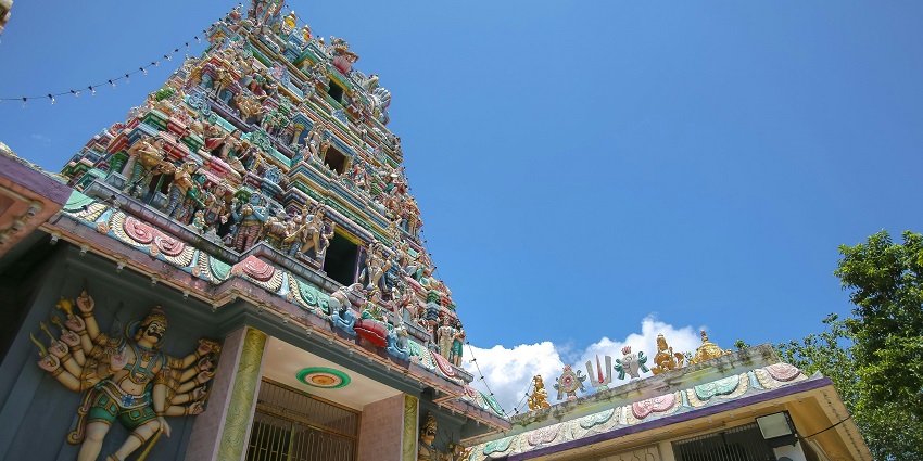 An image of a sacred shrine boasting its colourful and intricate architectural beauty.