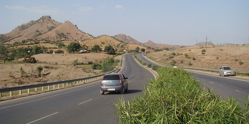 A quaint view of rustic hills and the path to reach Manesar, a beautiful tourist hotspot.