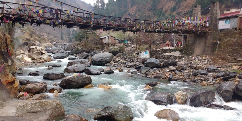 Picturesque view of a stream beating through the rocks under Manikaran bridge