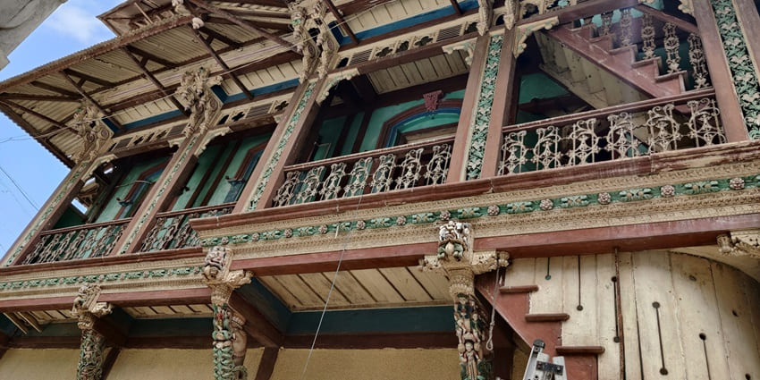 Visit this grand Indo-Portuguese mansion featuring intricate stucco scrolls, fruit carvings, one of the things to do in Diu.