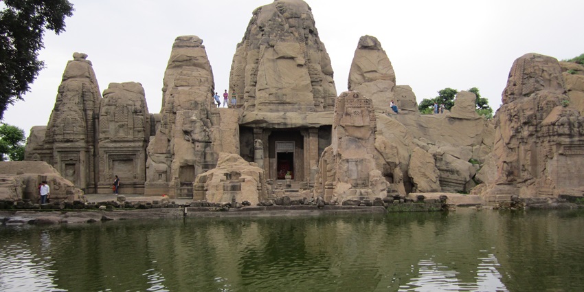 Image of Masroor rock-cut temple and adjoining water tank with historical significance