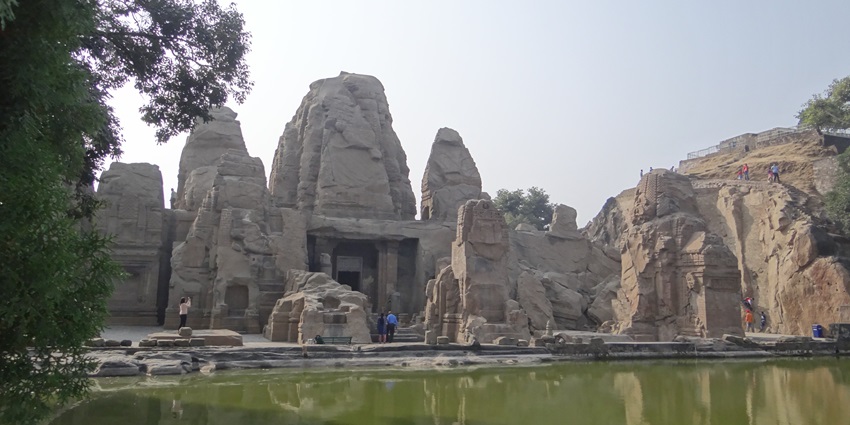 Front view of Masroor Rock Cut Temple, showcasing its intricate carvings and ancient rock-hewn architecture.