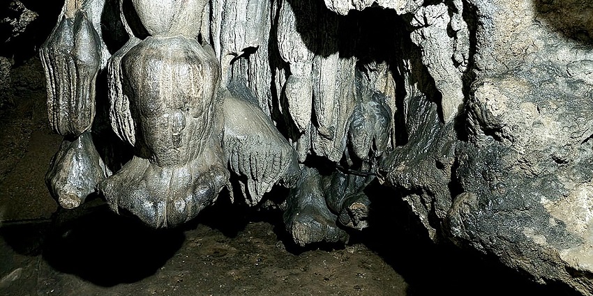 A breathtaking view of the Mawsmai Cave in Meghalaya during the daytime for travellers.