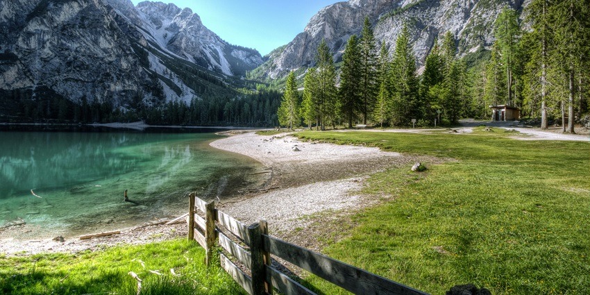 The Scenic image of the hill covered in lush green fields of Grass and trees, Gomati