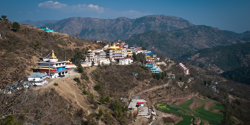 Image of Menri Monastery around the scenic hills views during day time