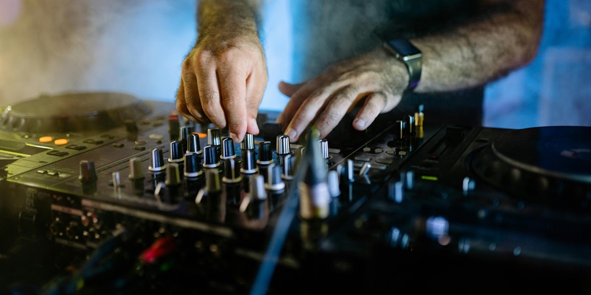 A view of a person playing DJ on the new year in Sri Lanka for travellers to enjoy.