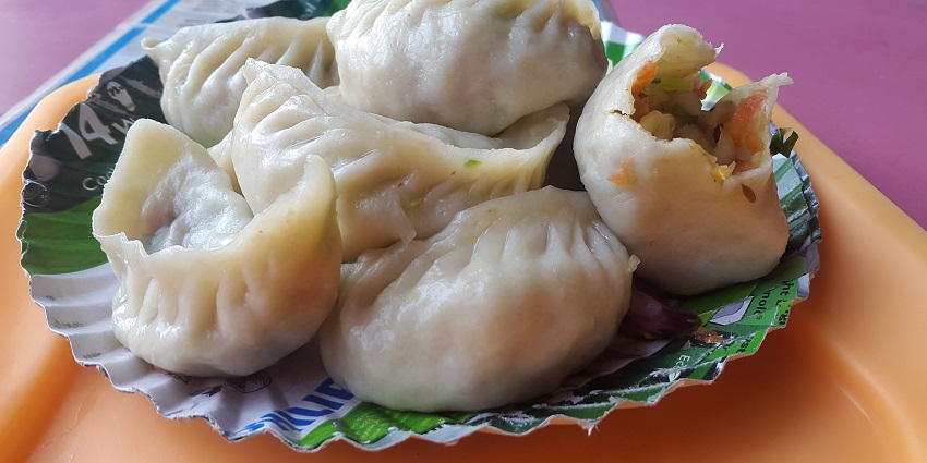 Try delicious momos during your trip to enjoy the local food in Himachal Pradesh.