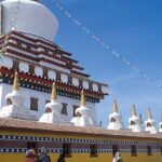 A mesmerising view of a monastery in Himachal Pradesh with white architecture for all.