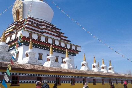 A mesmerising view of a monastery in Himachal Pradesh with white architecture for all.