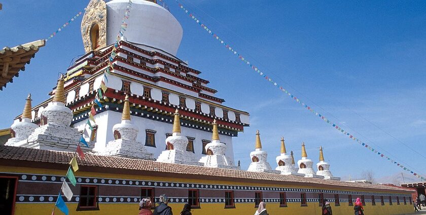 A mesmerising view of a monastery in Himachal Pradesh with white architecture for all.