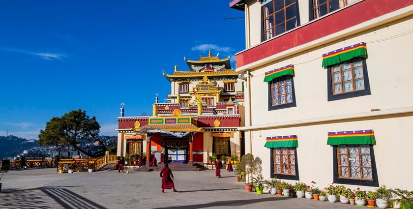 A breathtaking view of a monastery in Shimla with colourful architecture during the day.