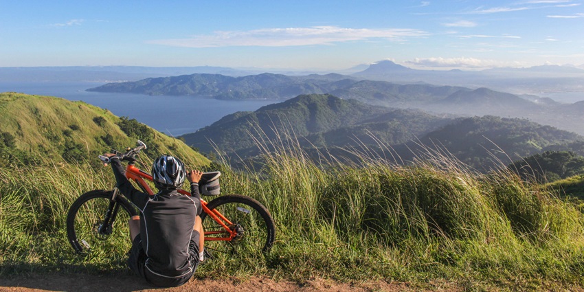 A biker enjoying the views of montains