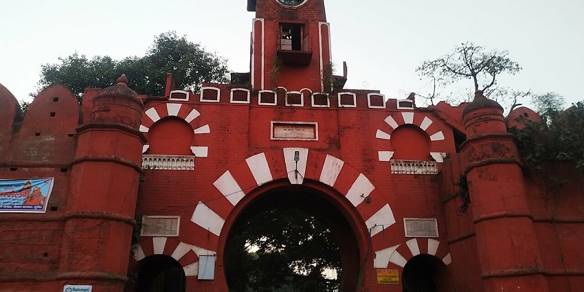 Historic forts in Bihar with imposing stone walls, lush greenery, and a serene atmosphere.