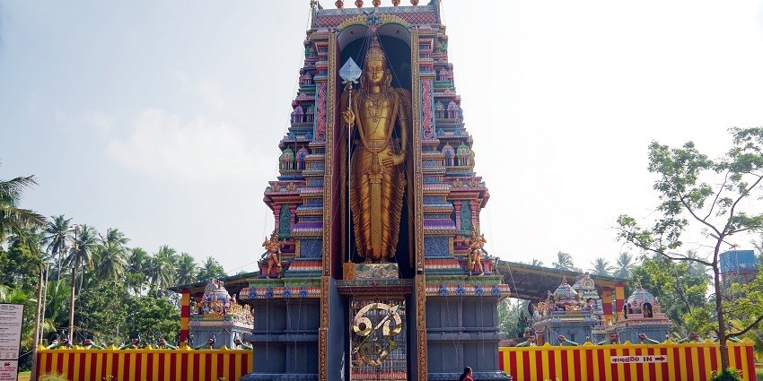Vibrant Munneswaram Temple, showcasing intricate architecture and colourful decorations.
