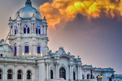 A serene view of the pristine white building of Agartala, a famous hotspot in the region.