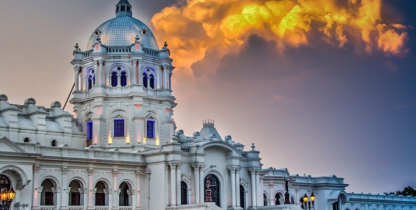 A serene view of the pristine white building of Agartala, a famous hotspot in the region.