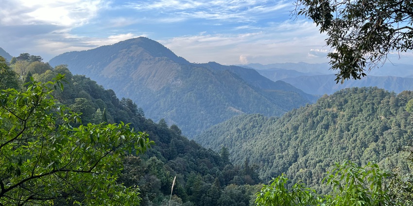 Image of Mussoorie, showcasing lush green hills - one of the budget hill stations near Delhi.