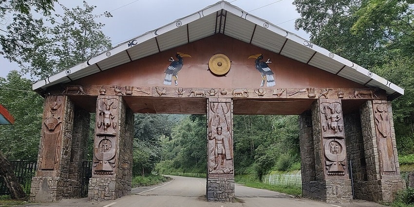 A breathtaking view of the entrance gate to Naga Heritage Village during the daytime.