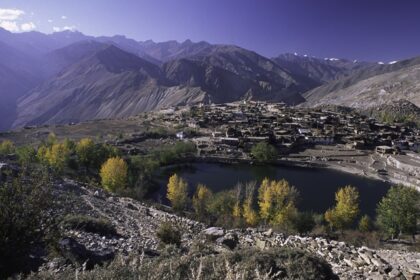 An exhilarating view of Nako Village and the lake on a bright sunny day in Himachal.