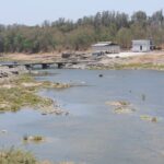 A picture showing the daylight view of Damanganga River, a popular tourist spot.