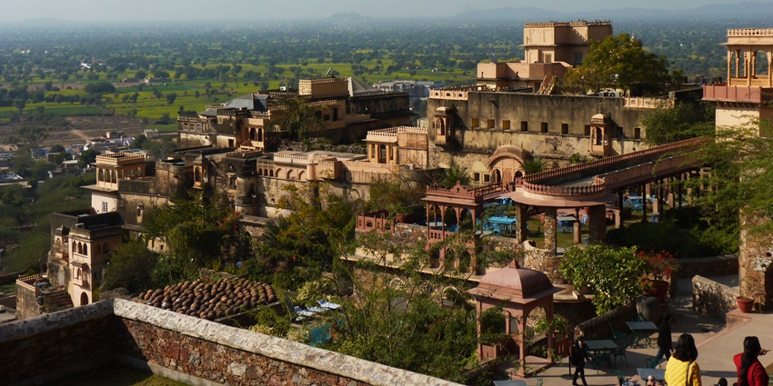 A picture of a historical palace built using traditional architecture, with various sections