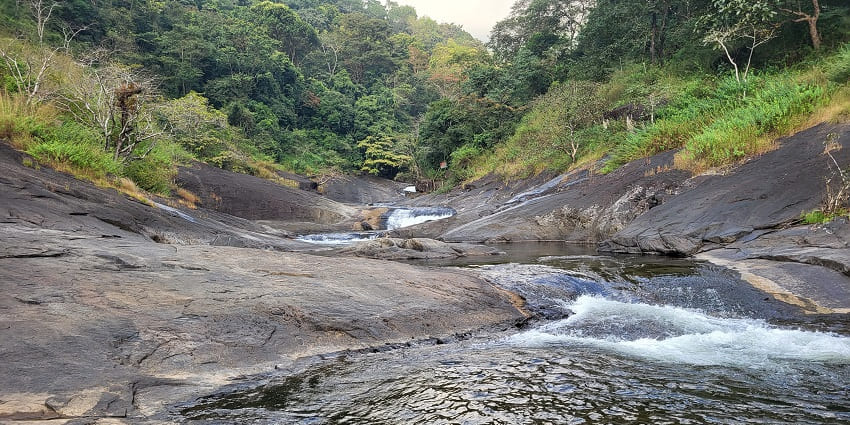 Visitors can enjoy the natural beauty at the picturesque Neer Veezhcha Waterfalls