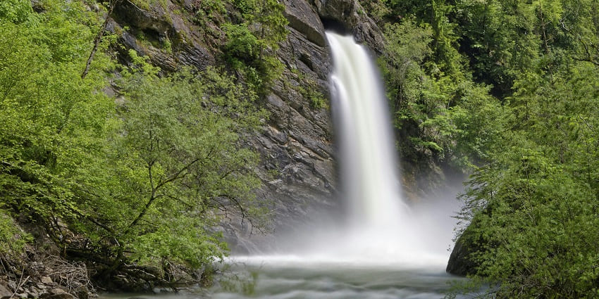 Image of a flowing river - Ngengpui Falls is one of the best Mizoram waterfalls.