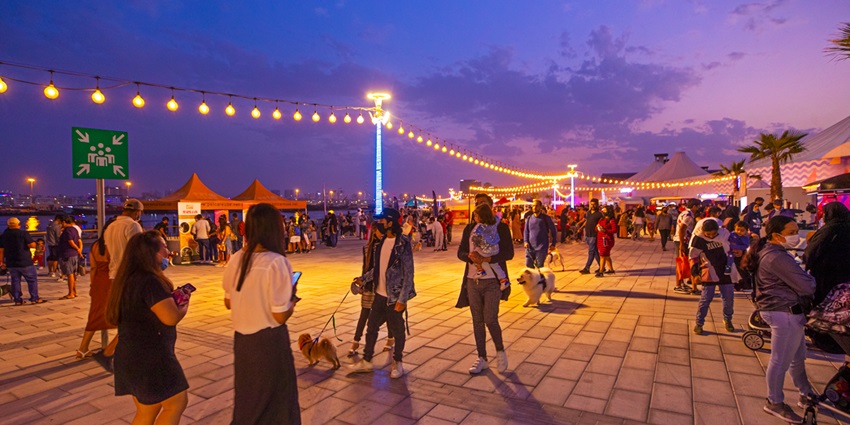People strolling around the famous night markets in Dubai