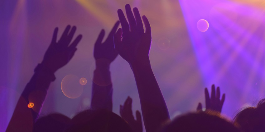 A glimpse of people dancing to the acoustical beats of ON14 Rooftop Bar & Lounge.