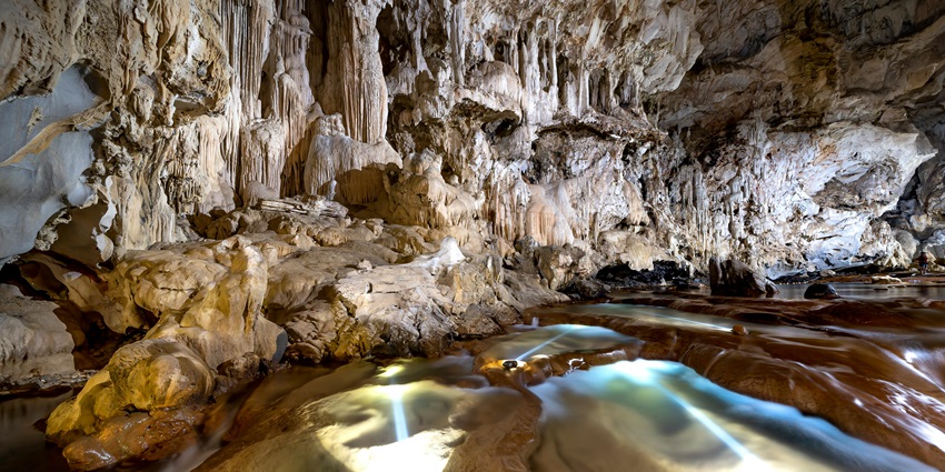 A picture depicting the process of limestone formation in the caves of Meghalaya