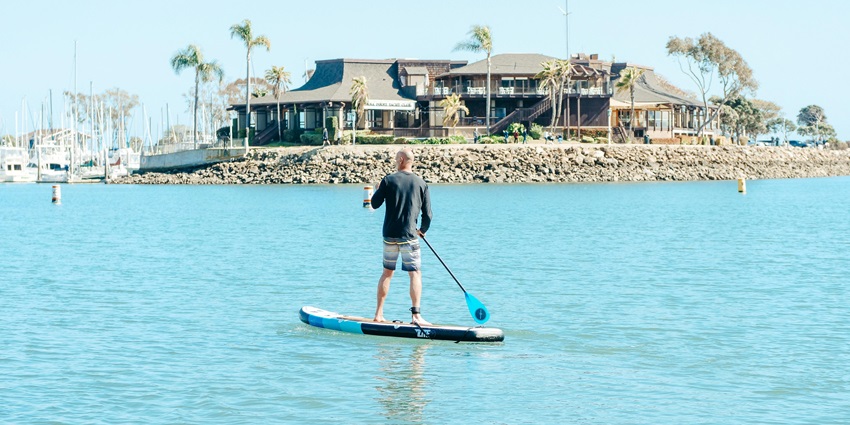 Indulge in one of the exciting water sports called Paddleboarding on your trip to Phuket.