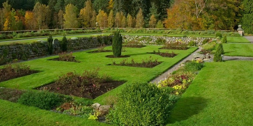 Beautifully landscaped garden at Balmoral Castle, with vibrant flowers and greenery.