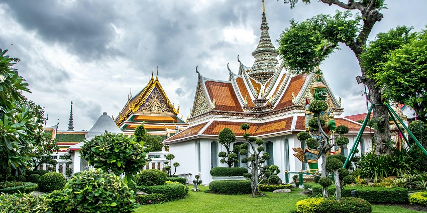 The Grand Palace in Bangkok, showcasing its majestic golden spires and intricate details.