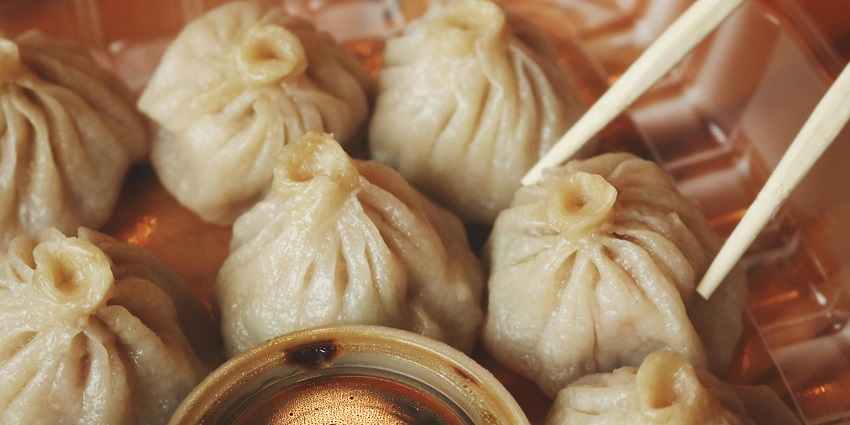 Pani Pitha are rice flour dumplings with a soft, slightly chewy exterior and a sweet, coconut-like filling.