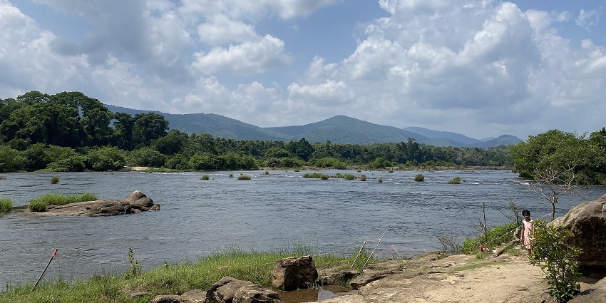 Paniyeli Poru Eco Tourism Centre in Kerala featuring rocky river streams and green forest