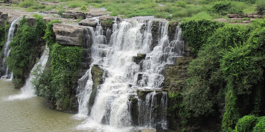 This waterfalls offers a refreshing and cleansing experience for devotees
